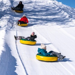 Glissade sur tube / chambre à air au Baluchon